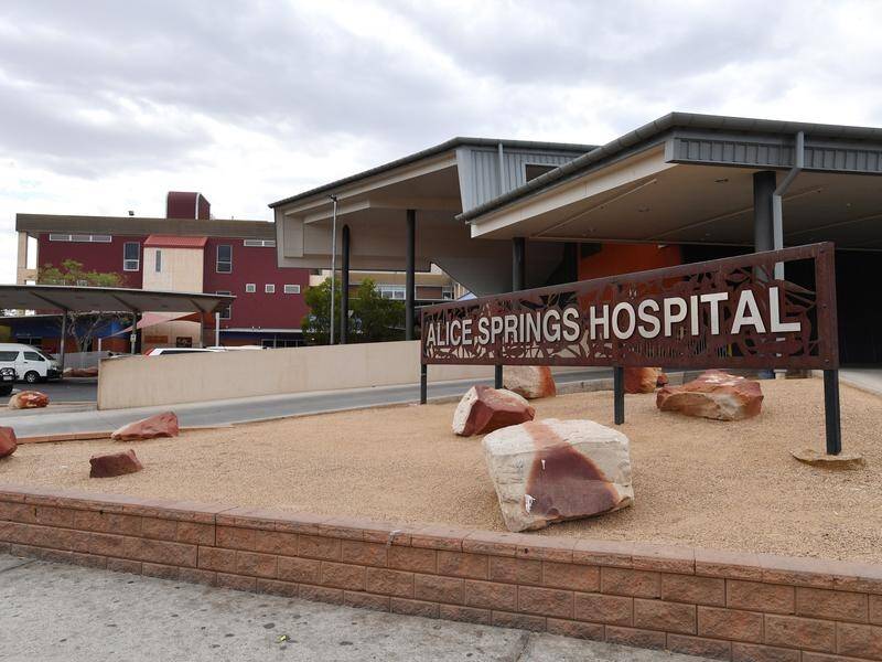 A 53-year-old man is recovering in Alice Springs Hospital after he was pulled from a burning ute.
