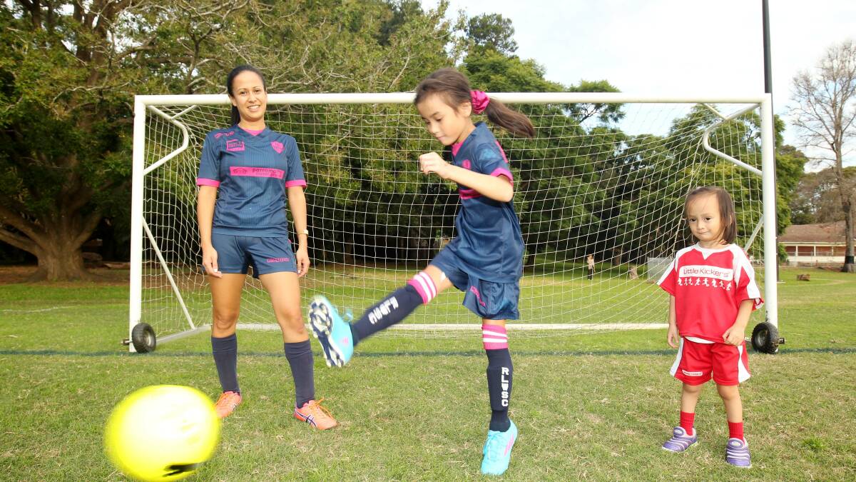 GIRL POWER: Mariam Fabia with Jessica and Ella at Callan Park Oval. Picture: Chris Lane
