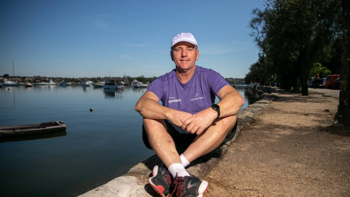 INSPIRATION: Dean Laws at Iron Cove Bay, where he completed a fundraising marathon. Picture: Geoff Jones