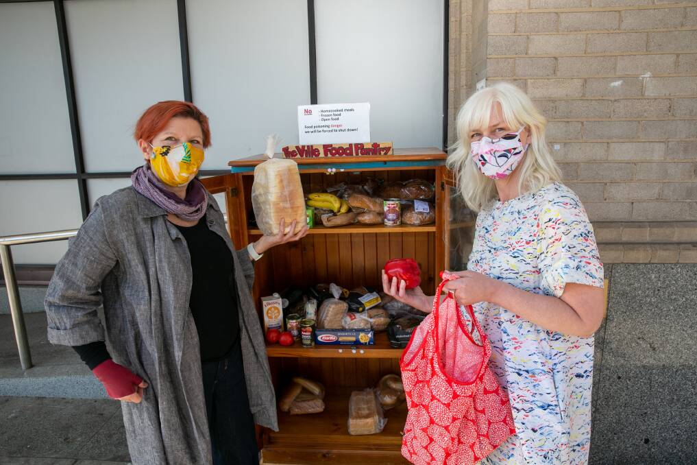AGAINST FOOD WASTE: Val Lehmann-Monck and Nicole Roberts at the 'Ville Food Pantry. Picture: Geoff Jones