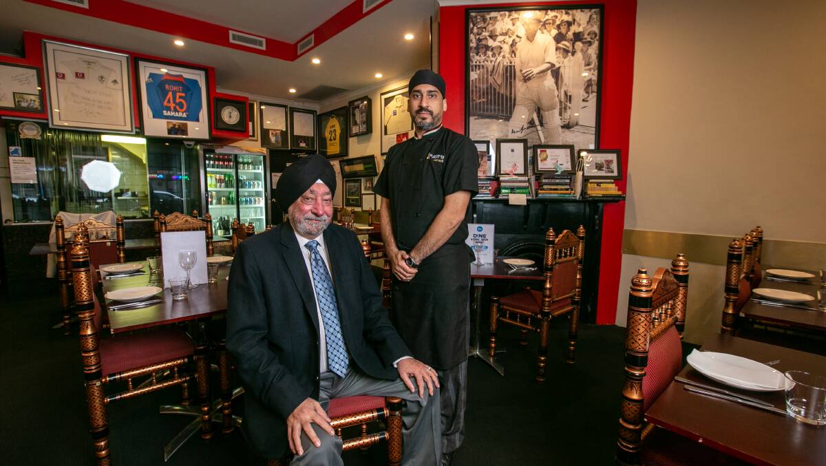 TRIBUTES: Surjit Gujral and his son Rasan in their Annandale Indian restaurant.