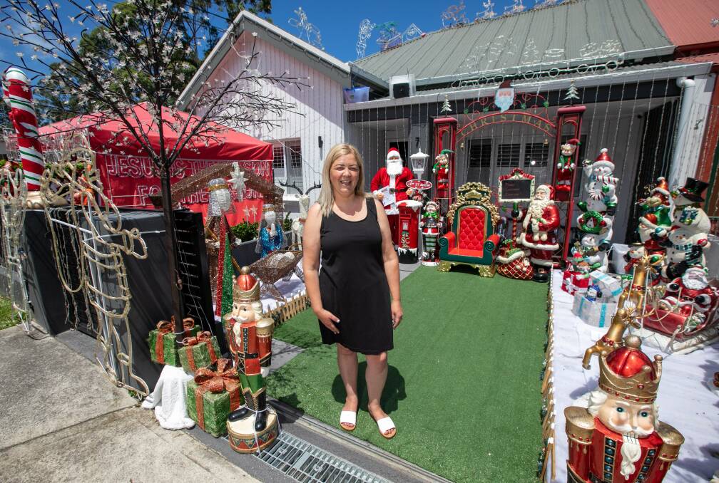 CHRISTMAS LIGHT QUEEN: Valentina Mickovska outside her colourfully decorated home on South Street in Tempe. Picture: Geoff Jones