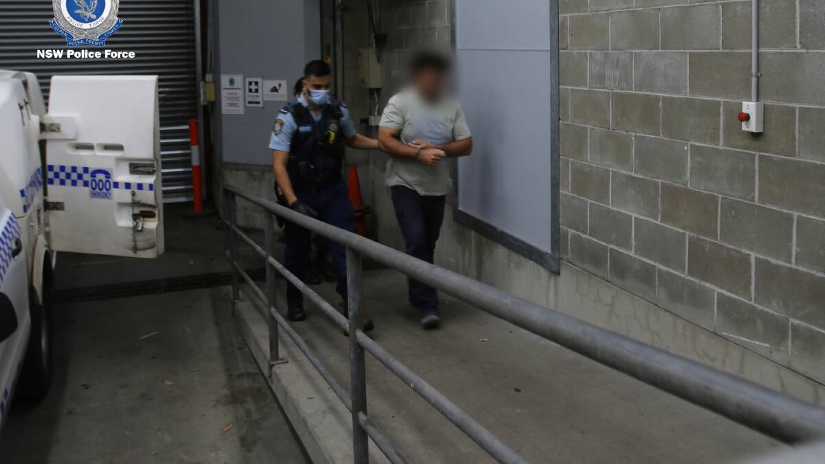 DNA BREAKTHROUGH: The man was taken to Bankstown Police Station where he is expected to be charged with multiple offences. Picture: NSW Police