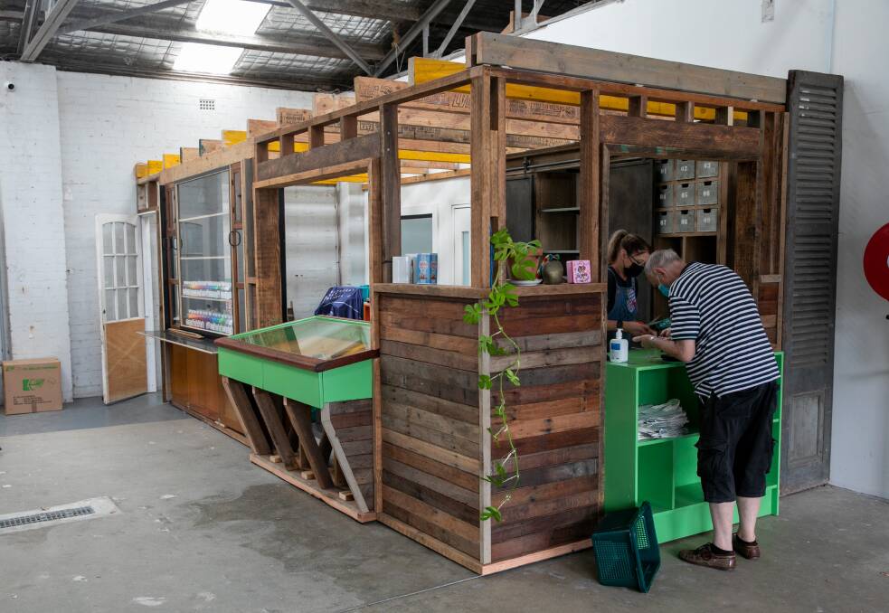 ENVIRONMENTAL ETHOS: In the spirit of reuse, the counter area at Reverse Garbage's new premises was constructed out of materials taken from the old location. Picture: Geoff Jones