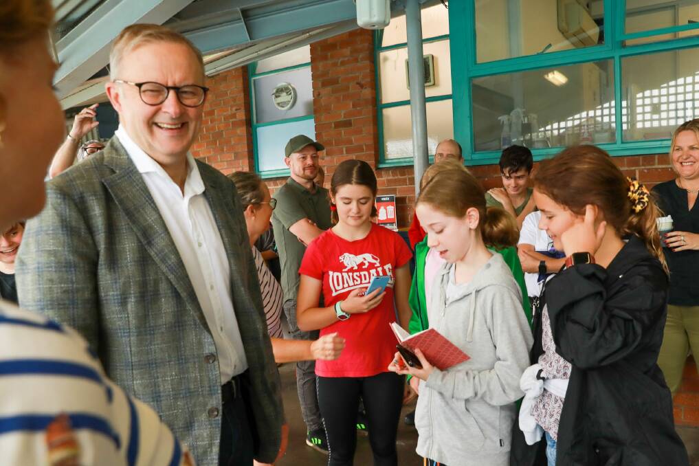 POOL PROMISE: Anthony Albanese talks to Kegworth Public School students at his campaign stop at the Leichhardt Park Aquatic Centre on Saturday. Photo: Supplied