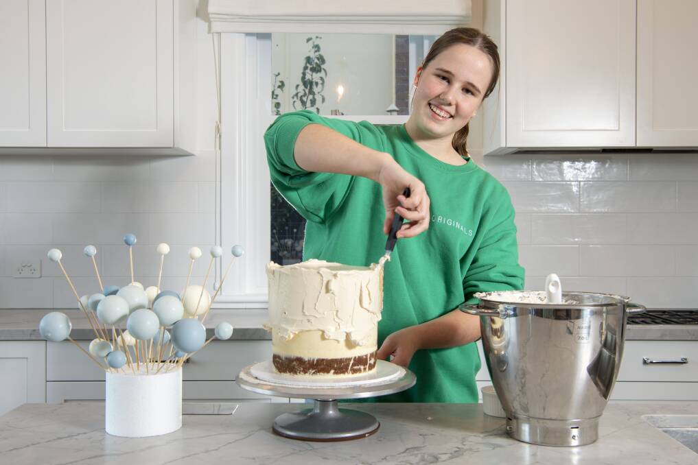 RISING STAR: Cake maker Molly Cameron in her kitchen in Haberfield. Picture: Simon Bullard