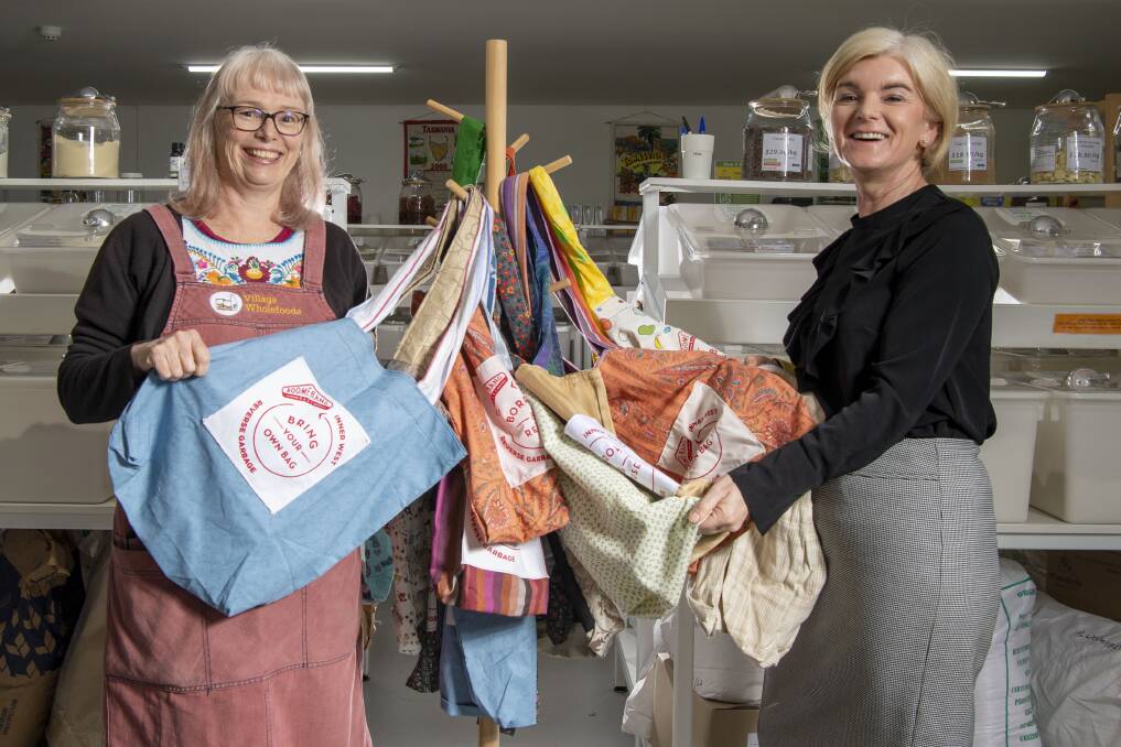 SEW GOOD: Suzanne Evans-Booth and Rachel Power with Boomerang bags at Village Wholefoods. Picture: Simon Bullard