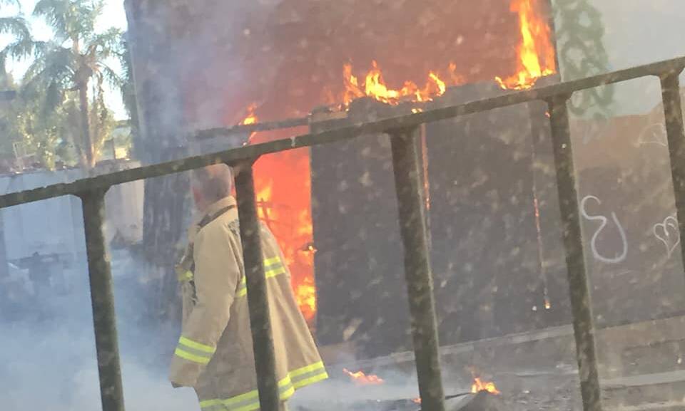 UNDER INVESTIGATION: A firefighter at the scene of the fire at the Balmain Leagues Club. Picture: Facebook/ Ross E Tesoriero