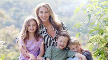 Amy Gerard with her children Charli, Bobby and Kobe. With a popular social media following, Amy, of Alfords Point, has written her first book. Picture by Chris Lane