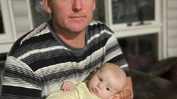 Ben Cullen, 39, and Roam Cullen, aged 3 months, were last seen on Sir Bertram Stevens Drive about 8.15pm on Thursday. Picture released by NSW Police
