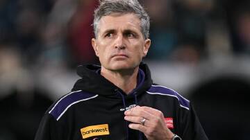 Dockers coach Justin Longmuir is urging AFL fans to cut out verbal abuse of players. (Michael Errey/AAP PHOTOS)
