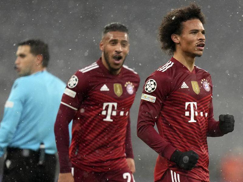 Leroy Sane (R) celebrates scoring the second of Bayern's three goals in the win over Barcelona.
