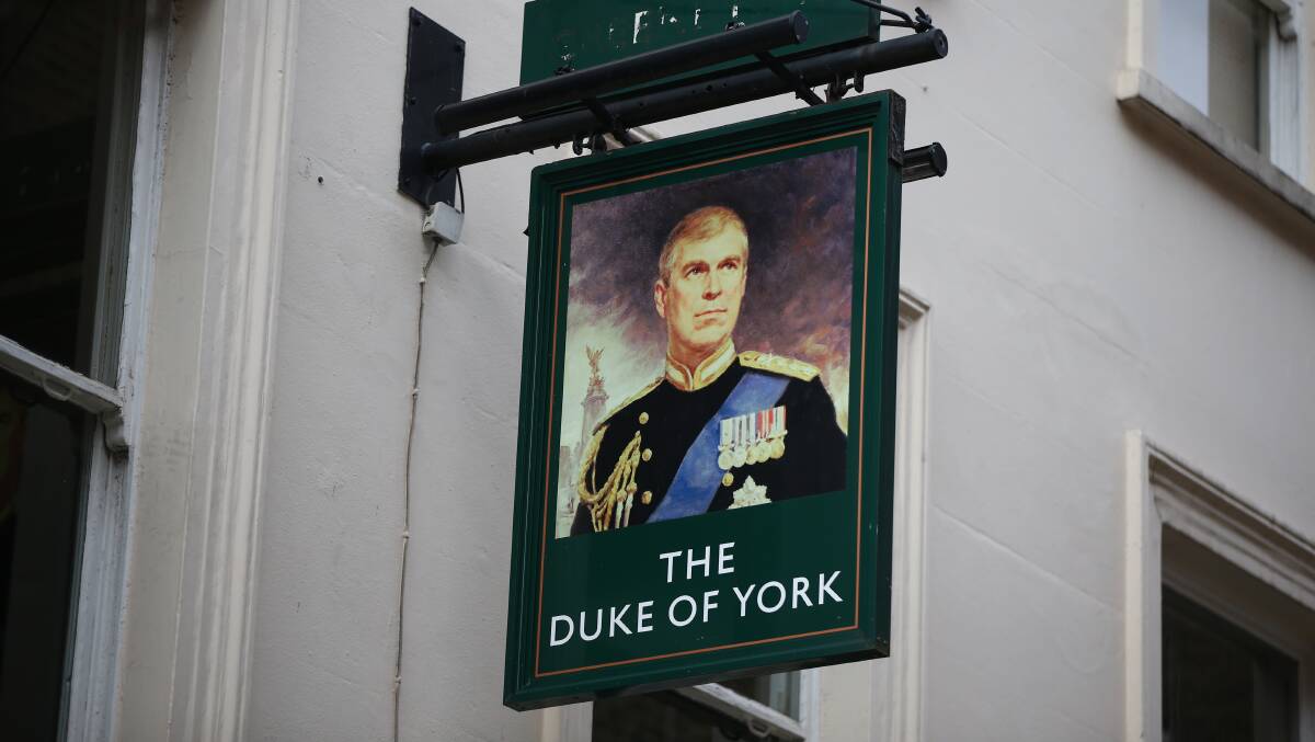 A portrait of Prince Andrew outside The Duke of York pub in London on January 16. Picture: Getty Images